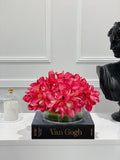 Magenta Orchids Centerpiece Arrangement In Glass Vase