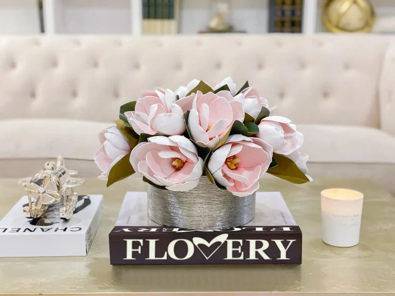 Magnolia Centerpiece in Cylinder Gold Vase