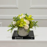 Real touch green orchid and ivory peony arrangement side view
