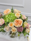 Peach rose lisianthus hydrangea centerpiece close-up