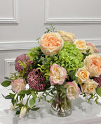 Peach rose lisianthus hydrangea centerpiece side view