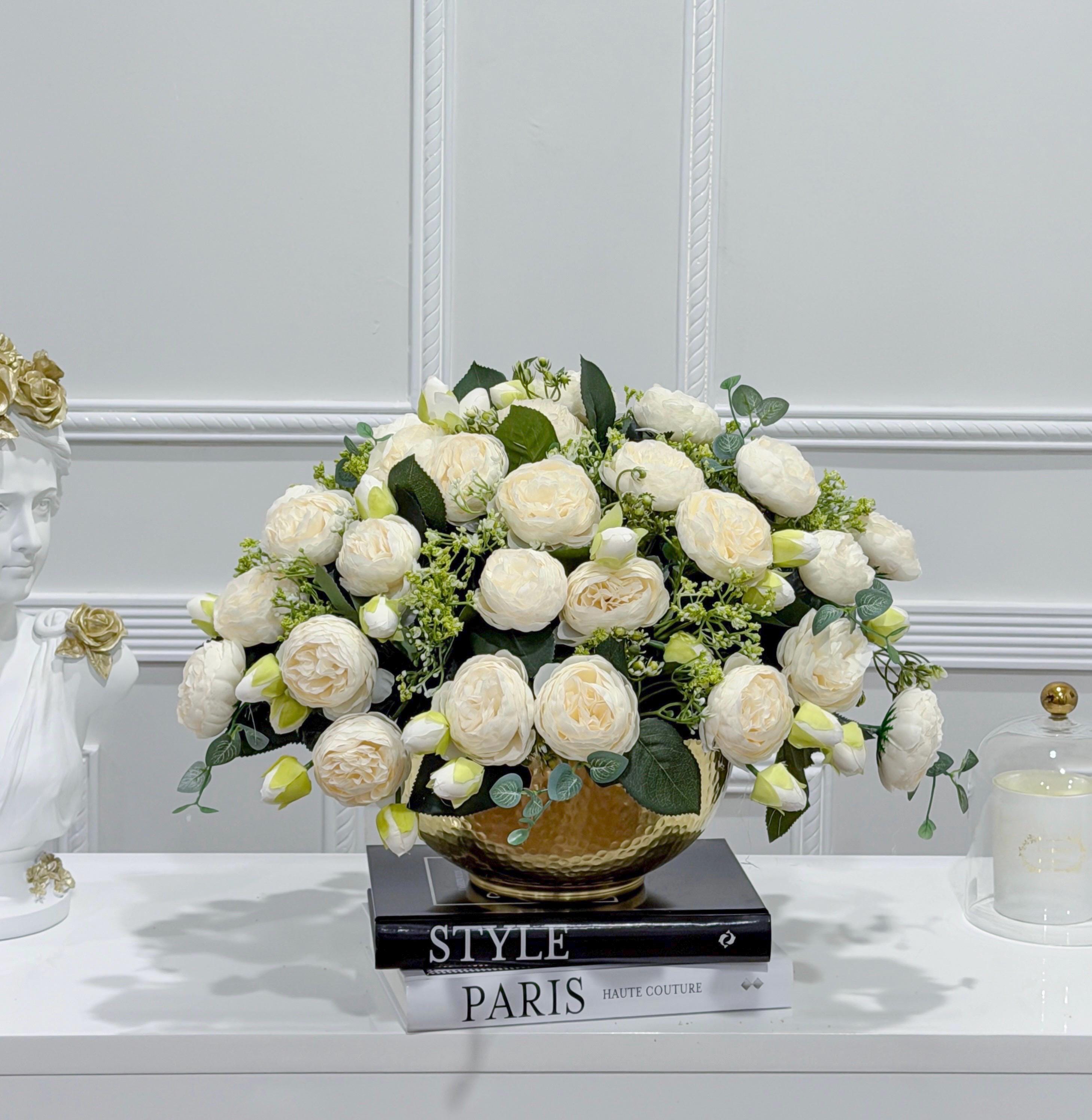White peony centerpiece in hammered gold bowl vase