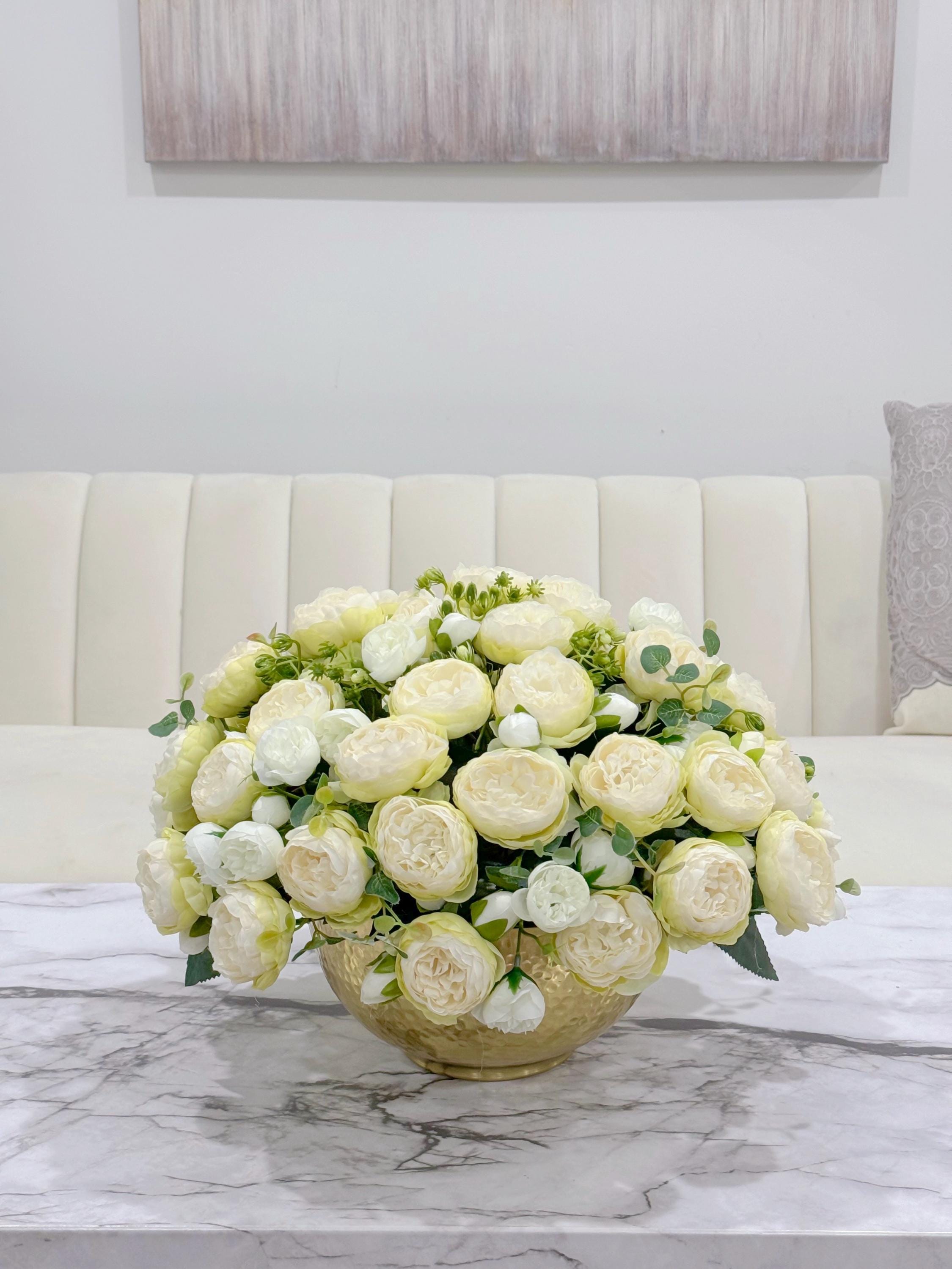 Ombre peony centerpiece on a marble table