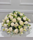 Overhead view of white peony centerpiece