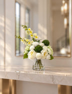 White peony and rose faux floral centerpiece with green hydrangea and snapdragons