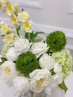 Handcrafted white green centerpiece with clear glass vase and faux water