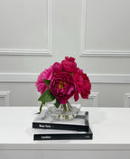 Premium silk magenta peony arrangement in a clear glass vase