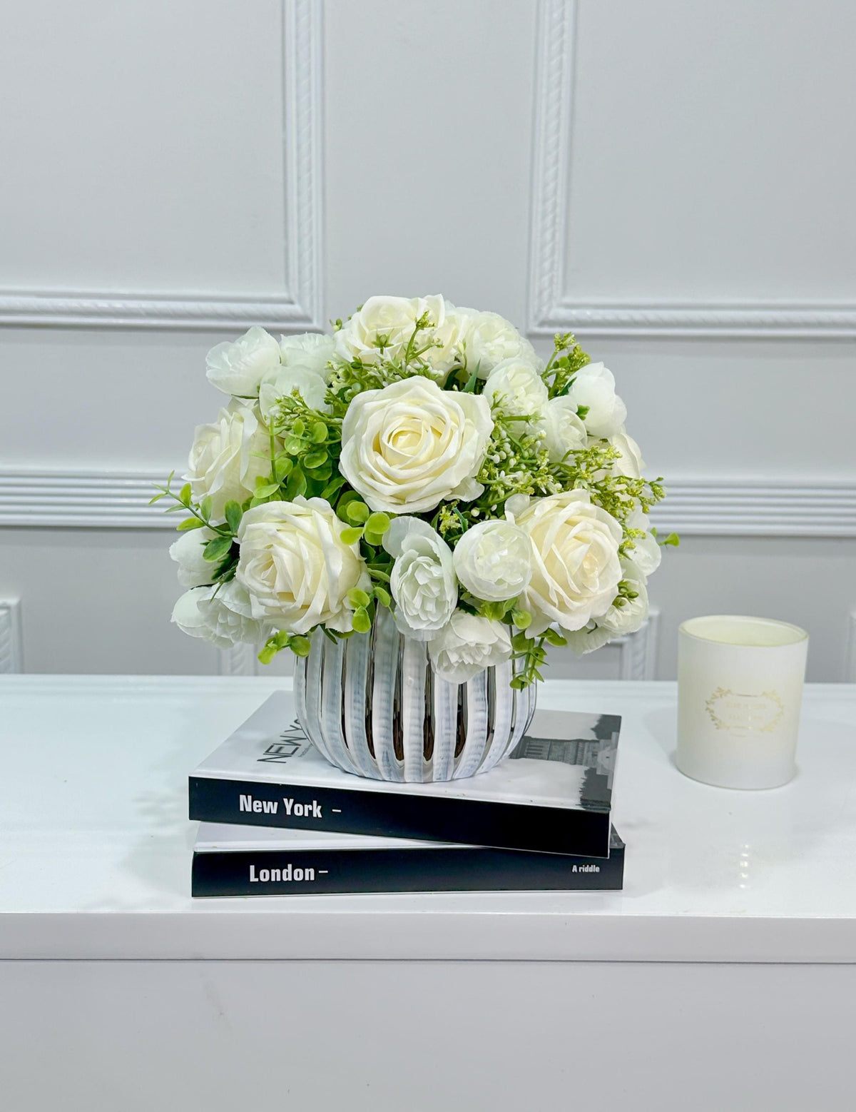 White silk rose and peony faux floral centerpiece in a ribbed vase