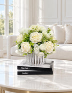 White silk rose and peony faux floral centerpiece in a ribbed vase