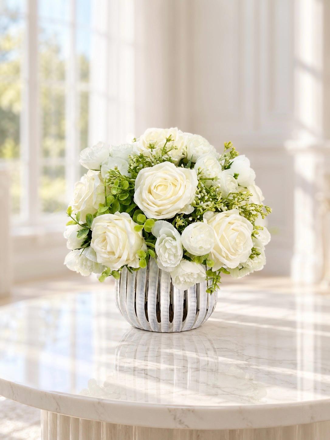 White silk rose and peony faux floral centerpiece in a ribbed vase