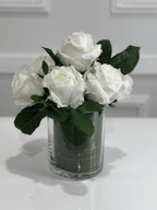 White rose arrangement in glass vase