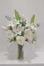 Large Elegant White Lilies Centerpiece In Tall Glass Vase