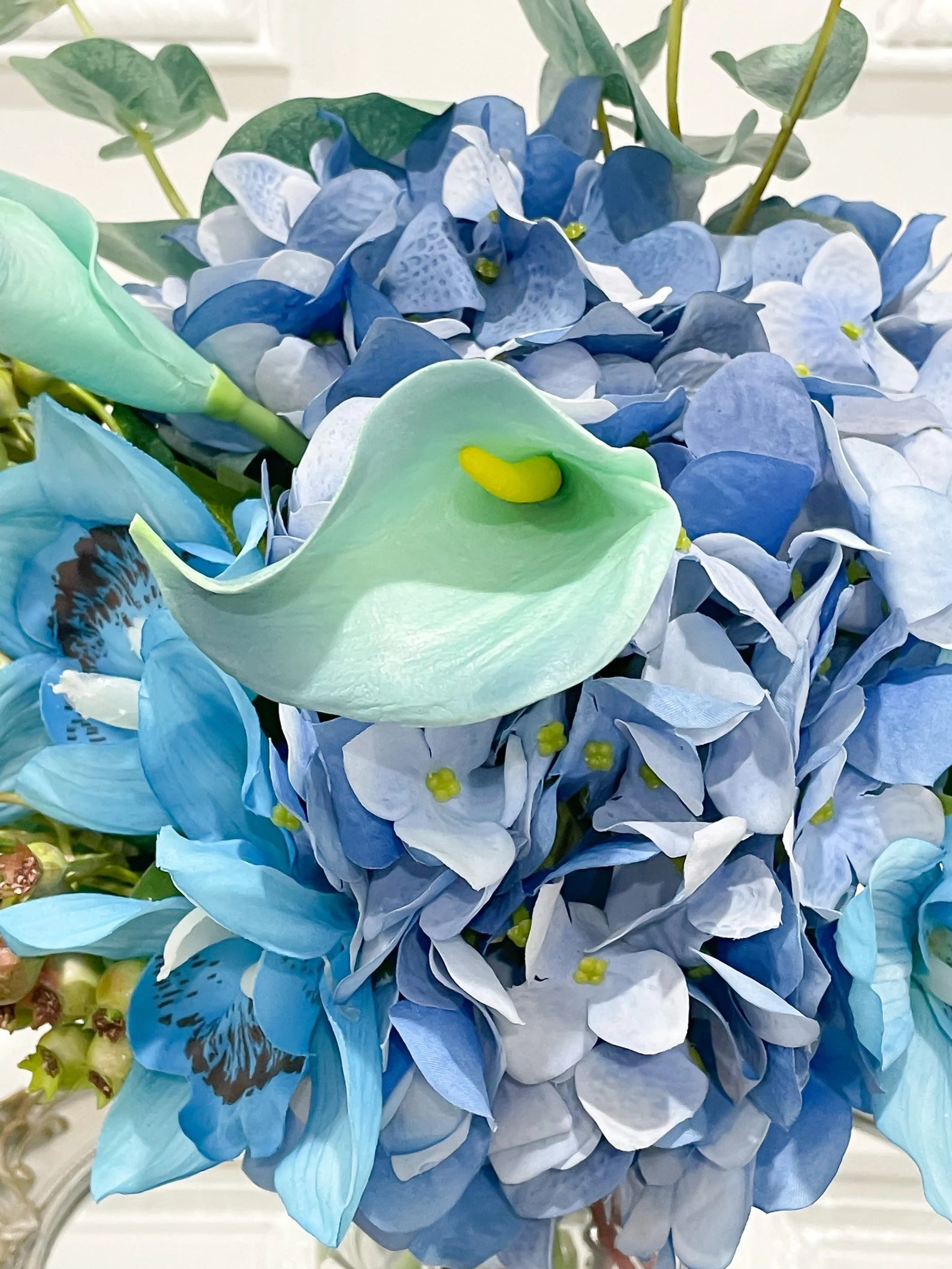 Real Touch Blue Hydrangea with Blue Calla Lily and Orchids Arrangment - Flovery