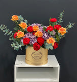 Elegant Multi Flower Centerpiece Gold Arrangement In Flovery Signature Box