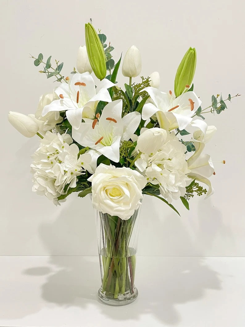 white lily vase Large Elegant White Lilies Centerpiece In Tall Glass Vase – Flovery.com